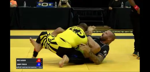 Broadcast still of Sonny Parlin grappling at the Grappling Pro Championship